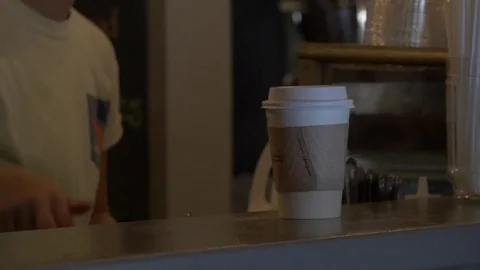 Barista Places Coffee On Counter Stock Footage 75252011