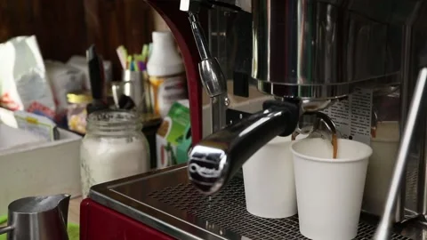 Barista prepares coffee in the coffee machine Stock Footage 98298975