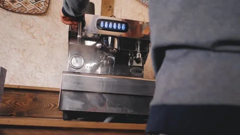 The barista prepares the coffee machine for work. Washing the coffee machine Stock Footage 202062421