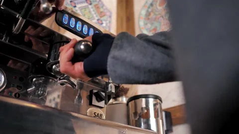 The barista prepares the coffee machine for work. Washing the coffee machine Stock Footage 202114964