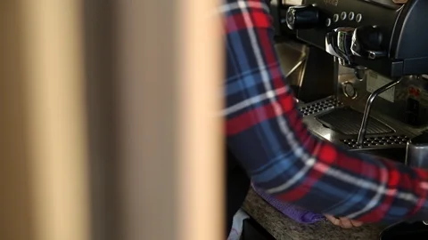 Barista preparing coffee in coffee machine Stock Footage 90599062