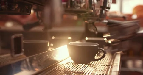 Barista preparing coffee machine and brewing espresso coffee at cafe Stock Footage
