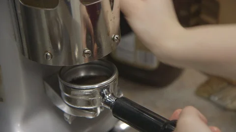 Barista preparing a cup of coffee Stock Footage 104866786