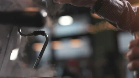 Barista preparing machine for making coffee Stock Footage 189370348
