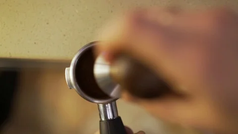 Barista presses the coffee close-up Stock Footage 87755540