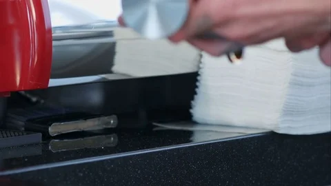 Barista presses ground coffee using tamper Vídeos de archivo 77423136