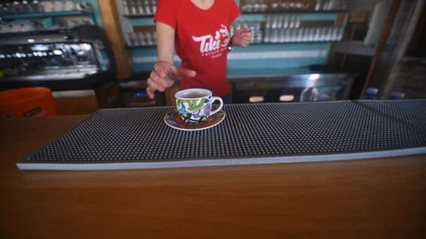 Barista serving a coffee at beach bar Stock Footage 108998216