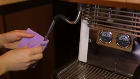 Barista spawns a steam pipe in a coffee machine Stock Footage 85815568