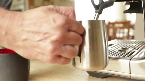 Barista steaming milk Stock Footage 131502086