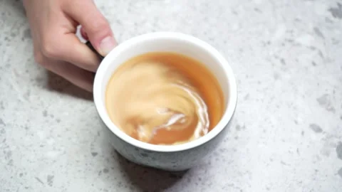 The barista steams the milk. The process of creating milk foam. Latte making Stock Footage 246832763