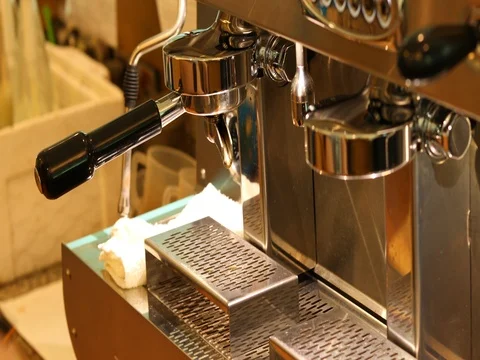 Barista using coffee machine in cafe restaurant Stock Footage 80470042