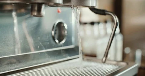 Barista at work in the cafe, close-up. Coffee making process in professional Stock-Footage 88741323