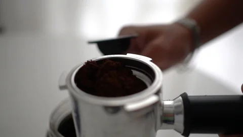 Barista at work in the cafe, close-up. Coffee making process in professional Stock Footage 101464348