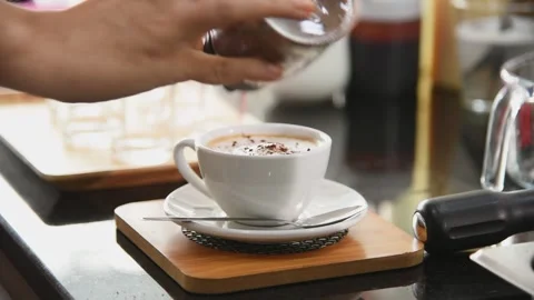 Barista worker preparing special beverage latte coffee at cafe coffee shop Stock Footage 135446811