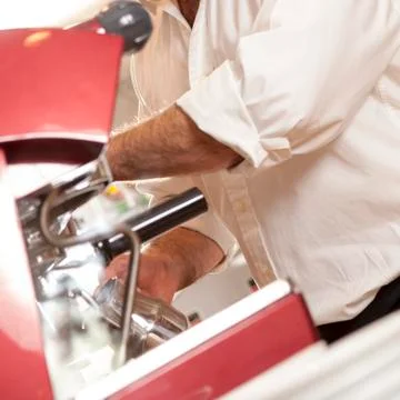 Barista Working By a Coffee Machine Stock Photos