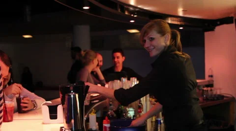 The barlady in the bar of disco prepares some cocktails Stock Footage 59740396