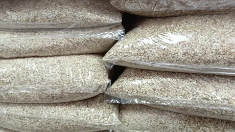 Barley groats in a package on the shelf in the store. Grocery on the counter in Stock-Footage 336182751