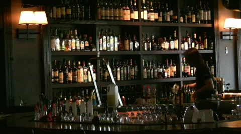 Barman cleans wine bar Stock Footage
