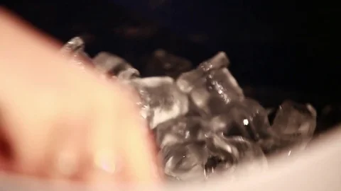 The barman collects ice from the bucket. Stock Footage 80309259