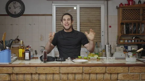 Barman introducing new cocktail tutorial for his channel in a traditional Stock Footage 205316160