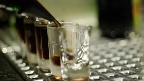The barman makes a cocktail-shot Stock-Footage 130774732
