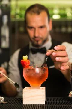 Barman is making a cocktail Stock Photos