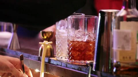 Barman making drinks in bar Stock Footage 60794461