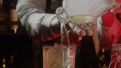Barman pouring a cold drink Stock Footage 255700873