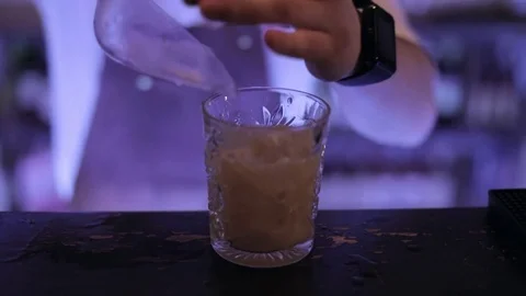 Barman is preparing a  cocktail. Stock Footage 75354147