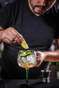 Barman preparing cocktail Stock Photos