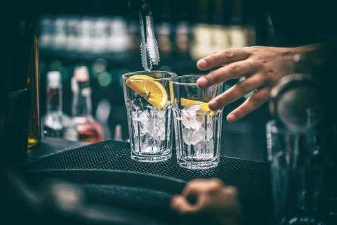 Barman preparing cocktail Stock Photos