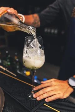 Barman is preparing a cocktail Stock Photos