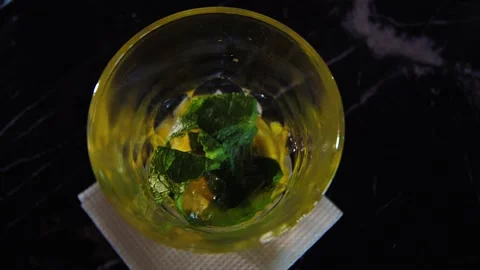 Barman puts ice in a cocktail Stock Footage 150115923