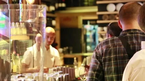 Barman serving drinks in a bar Stock Footage 40899970