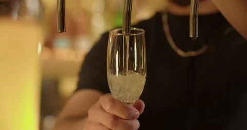 Barman serving prosecco Stock Footage 203900825