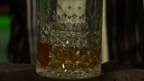 Barman stirring cocktail in a glass video Stock Footage 87585853