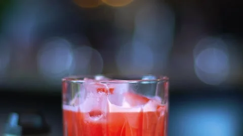 The barman stirring the ice drink. Stock Footage 136815880