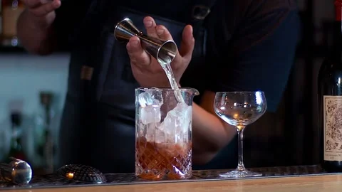 The barman stirring the ice drink. Stock Footage 136815952