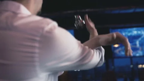 Barman throws a shaker close-up Video stock 73761554