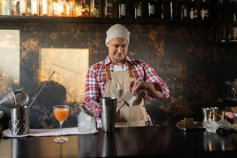 Barman at work, preparing cocktails. concept about service and beverages. Stock Photos