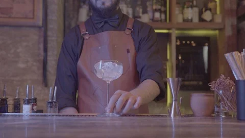 Barman At Work Put Ice Into Glass Close-Up Stock Footage 109014147