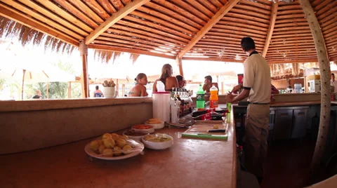 Barman working in a resort bar in Marsa Matruh, Egypt Stock Footage 38830304