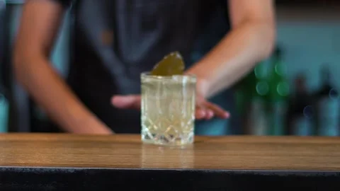 The barman's made a cocktail. Stock Footage 136815901