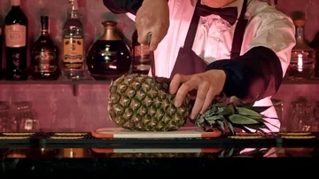 Barmen cut pineapple Stock Footage 85975097