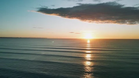 Barmston Beach drone forward tilt sunrise Stock Footage 247490856