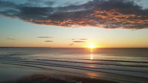 Barmston Beach orbit sunrise Stock Footage 247490631