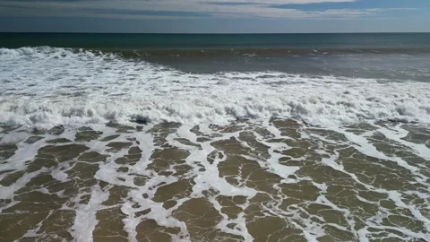 Barmston forward and raise drone footage of the sea Stock Footage 247641939
