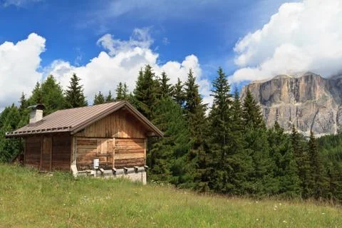 Barn on Alpine pasture Stock Photos