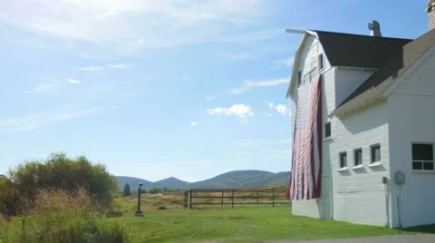 Barn and flag side sun shot Vídeos de archivo 54565955
