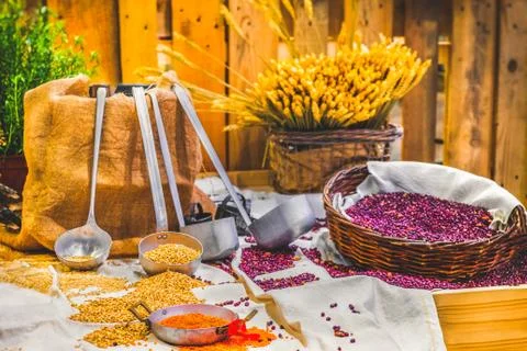 Barn building interior table with cereals grains ladle farm granary traditional Stock Photos